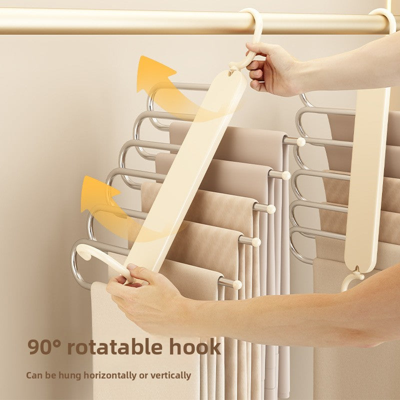 Foldable Multi-layer Pants Hanger with cream-colored plastic frame and silver metal bars, featuring a 90-degree rotating hook.