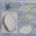 Glass Frosted Exfoliator in matte white with a smooth, rounded flatback body and textured nano-glass surface pads