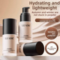 Goddess Beauty Pure Beauty liquid foundation in pale ivory bottles with black pumps and caps, labeled hydration and lightweight coverage.