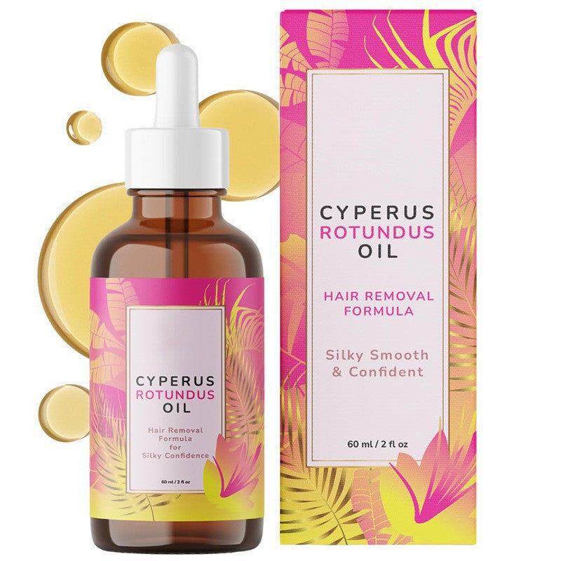 Hair removal oil bottle and box in amber glass with pink, yellow, and green botanical graphics; Hair Removal Cyperus Rotundus formula.