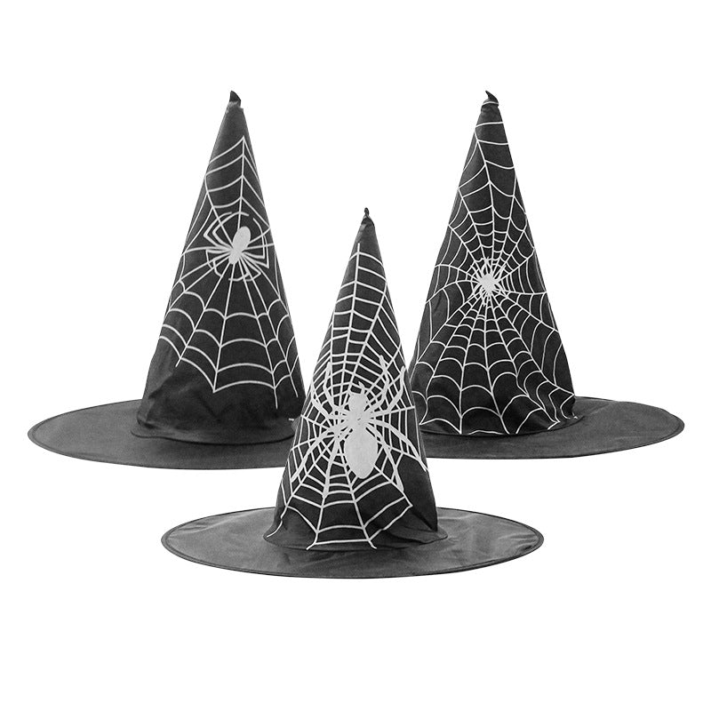 Halloween Hat featuring three black pointed cloth witch hats with white spiderweb patterns and spider motifs