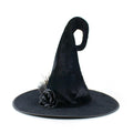 Halloween Hat in black velvet with a curled pointed crown, wide brim, and decorative black fabric rose with feather trim