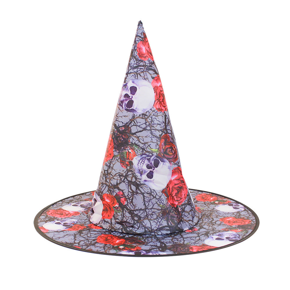Halloween Hat with a tall pointed crown, gray cobweb print, red roses, and white skull motifs on the brim