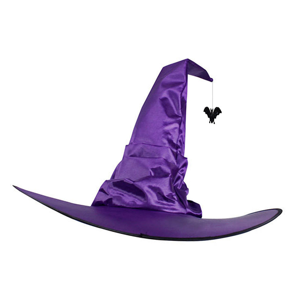 Halloween Hat in glossy purple cloth with a tall bent pointed crown, wide curved brim, and dangling black bat charm