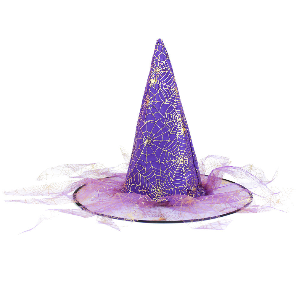 Halloween Hat in purple fabric with a pointed crown, gold spiderweb pattern, and sheer tulle trim around the brim