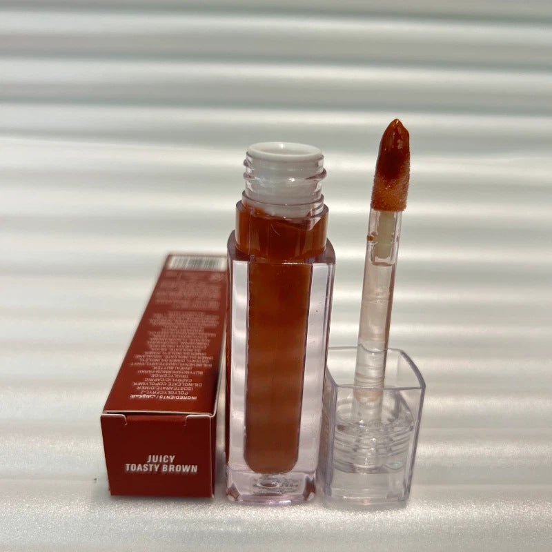 Huda Beauty Moisturizing lip gloss in a clear rectangular tube, with warm brown gloss and matching applicator