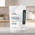 Hydrogen Boosting Tablets in a white Googeer pouch with dark green unflavored label and white tablets beside it