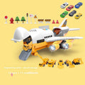 Inertia Transforming Aircraft Toy with white and orange plastic jet, opening cargo ramp, small cars, construction vehicles and roadblocks