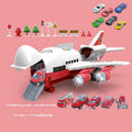 Inertia Transforming Aircraft Toy in white and red plastic with a hinged cargo bay, ramp, emergency vehicles and roadblocks
