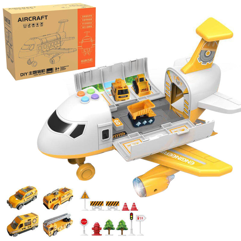 Inertia Transforming Aircraft Toy in white, gray and yellow plastic, opening to reveal a vehicle bay with four cars and road accessories