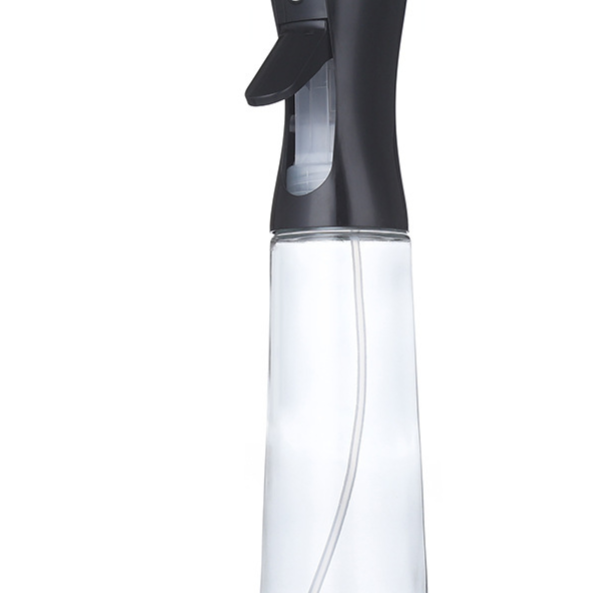 Kitchen Oil Spray Bottle with a clear transparent body, black trigger sprayer, and visible internal dip tube