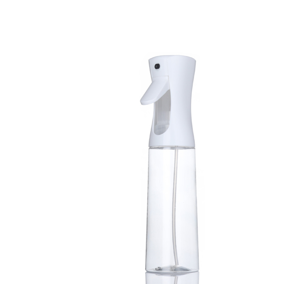 Kitchen Oil Spray Bottle with a clear plastic reservoir, white trigger sprayer, and slim transparent design