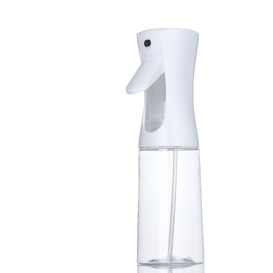 Kitchen Oil Spray Bottle with a white plastic trigger top and a clear, slim reservoir with visible dip tube