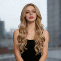 Long Curly Synthetic Wigs in blonde with a center part, long voluminous waves, and a natural-looking texture