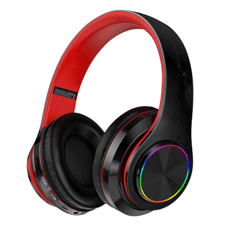 Luminous Bluetooth Headphones in black plastic with red inner headband, padded ear cups, and a multicolour LED ring.