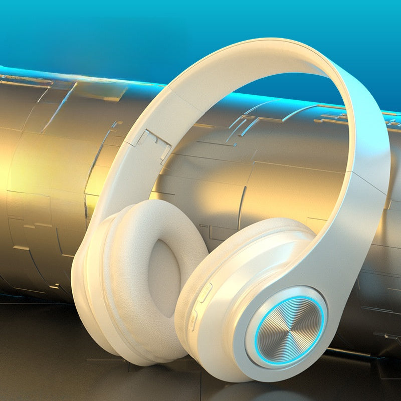 Luminous Bluetooth Headphones in black plastic with red inner headband, padded ear cups, and a multicolour LED ring.