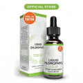 Maca Root Liquid Drops label on a dark glass dropper bottle beside matching green-and-white liquid chlorophyll packaging