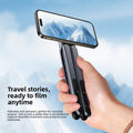 Magnetic Phone Holder Stand shown in black, folded aluminum with a phone mounted horizontally for handheld filming