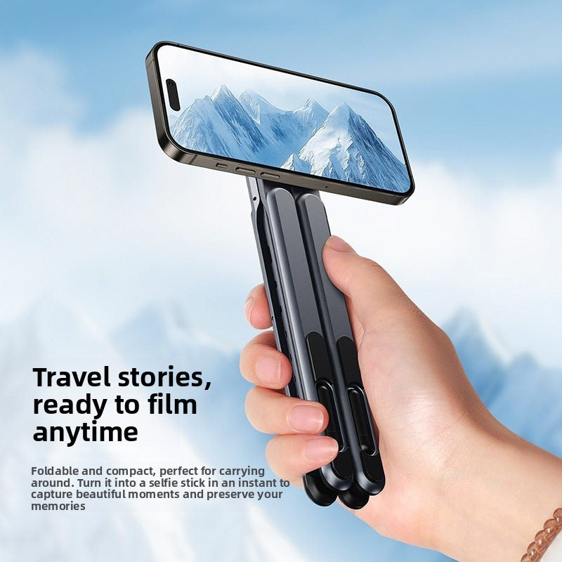 Magnetic Phone Holder Stand shown in black, folded aluminum with a phone mounted horizontally for handheld filming
