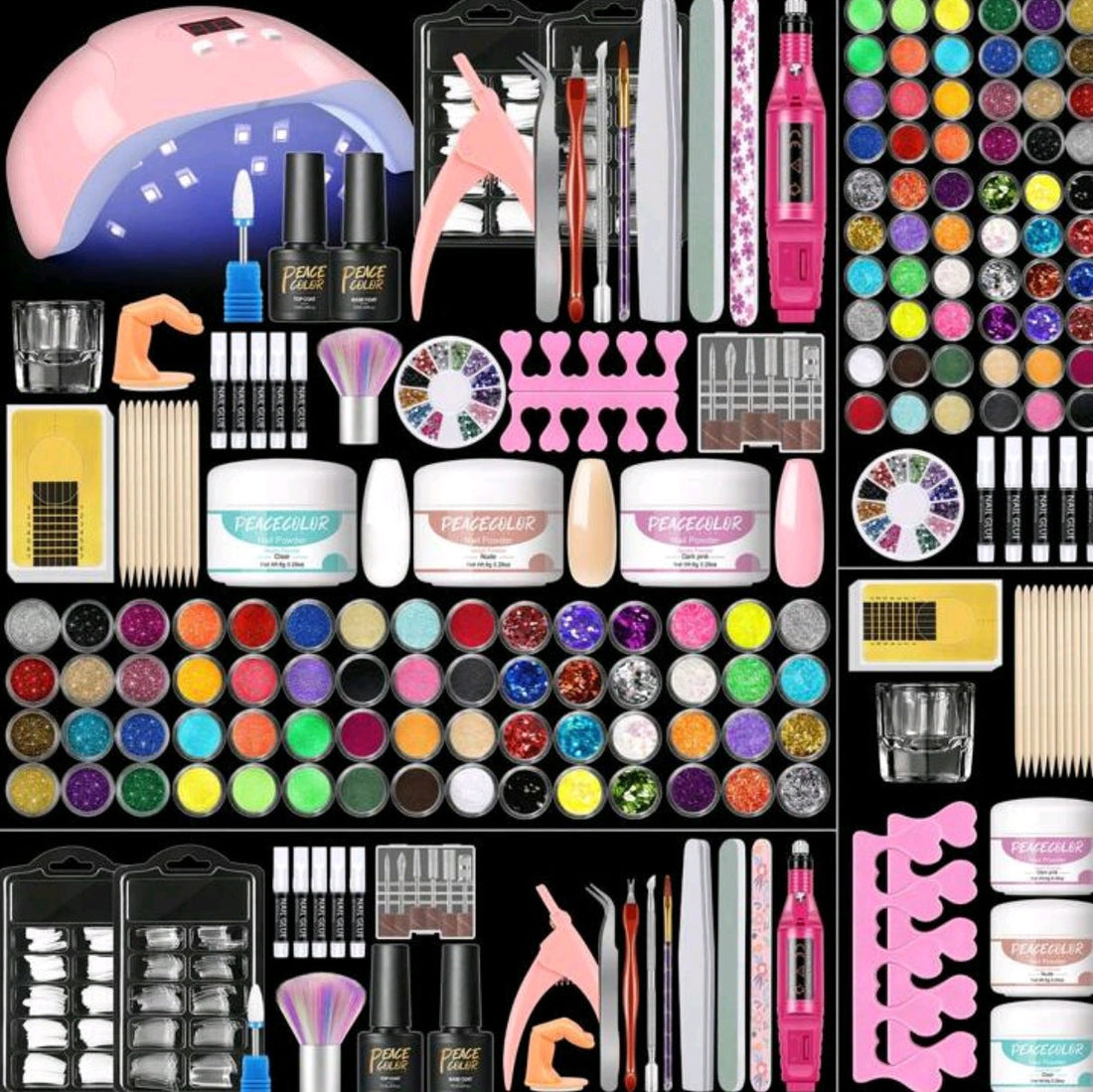 Manicure Tools Set with a pink UV nail lamp, black polish bottles, colorful glitter pots, acrylic jars and tools in an assortment.