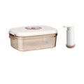 Manual Vacuum Food storage box in clear rectangular plastic with a cream lid, tan clasps and matching hand pump