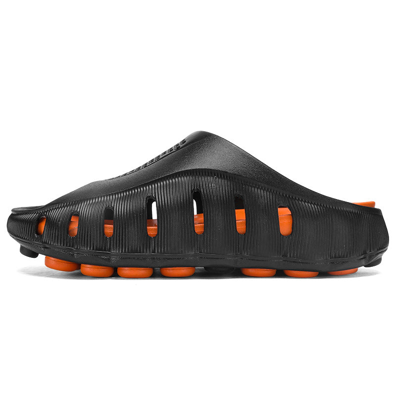 Mens Summer Outdoor Clogs in black EVA with orange sole accents, featuring a closed toe, ventilated side slots and a thick sole