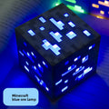 Minecraft Ore lamps cube-shaped blue ore lamp with a dark pixelated surface and bright glowing blue square details