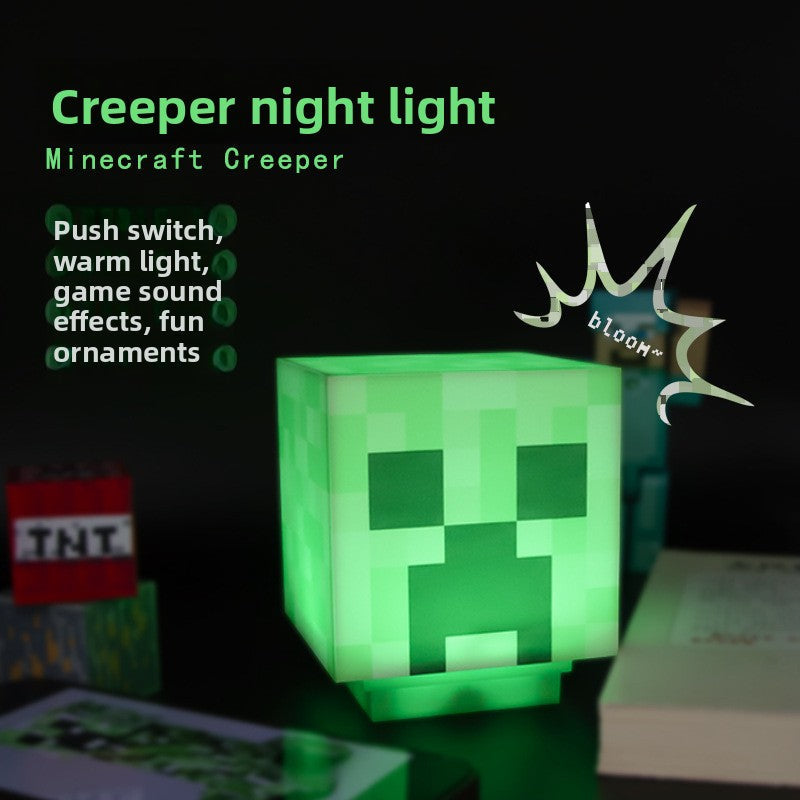 Minecraft Ore lamps include a glowing green Creeper night light with a pixelated face and cube-shaped design