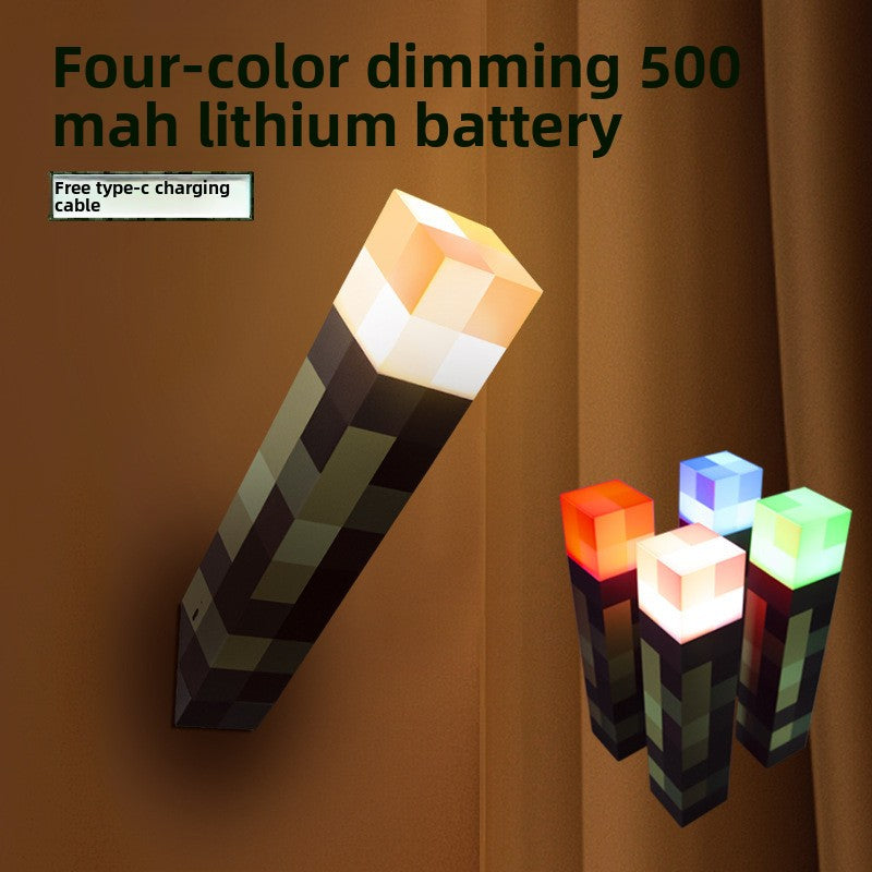Minecraft Ore lamps with pixelated black and green torch bodies, shown with glowing amber and multicolor tops.