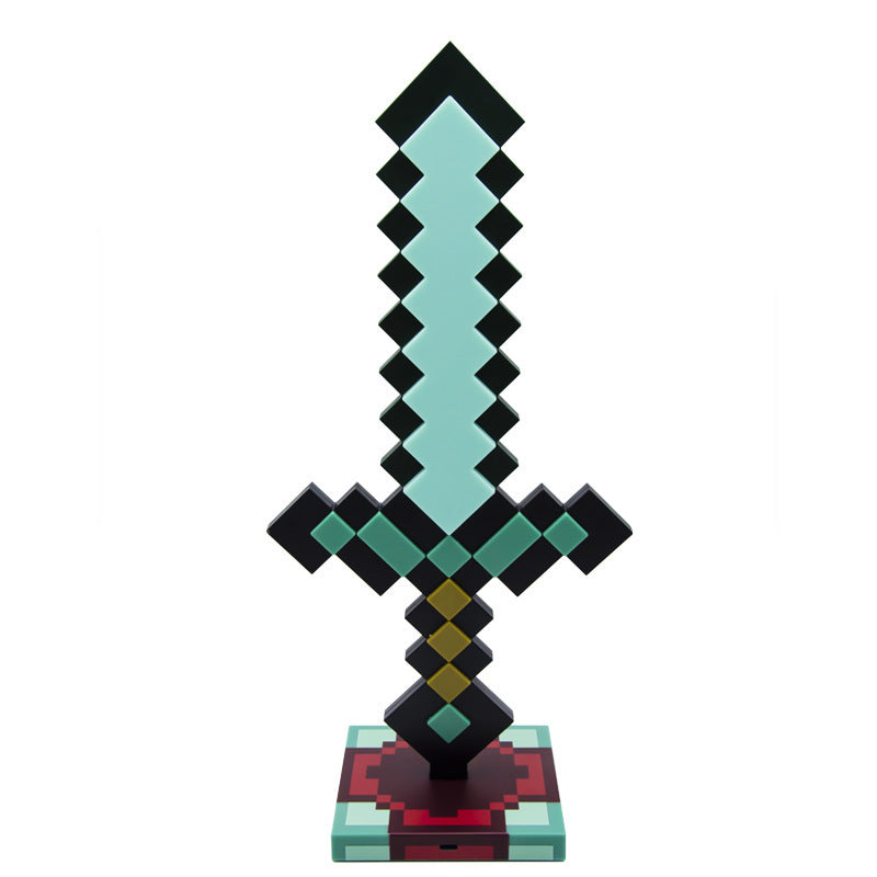 Minecraft Ore lamps sword-shaped lamp with a pale cyan pixelated blade, black and teal hilt, and blocky base