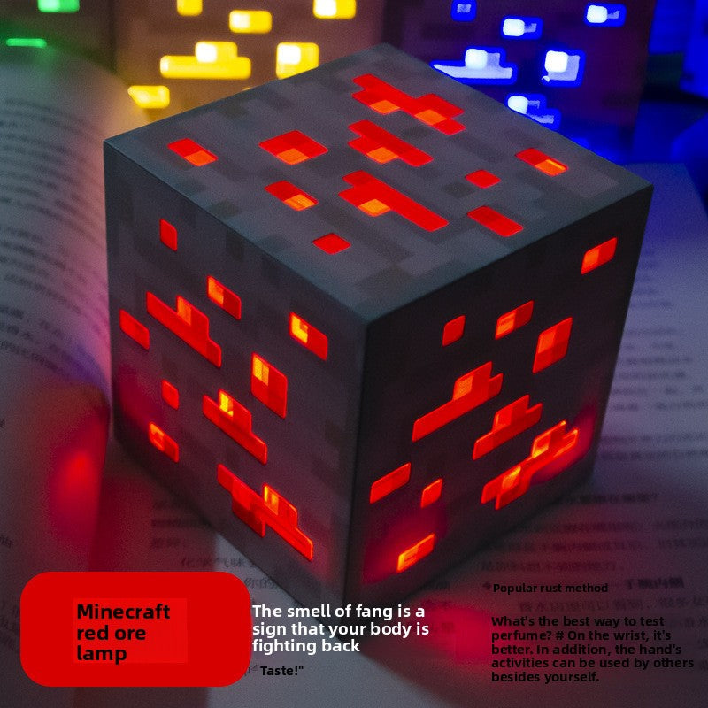 Minecraft Ore lamps redstone ore cube lamp with pixelated dark gray sides and glowing red-orange square details