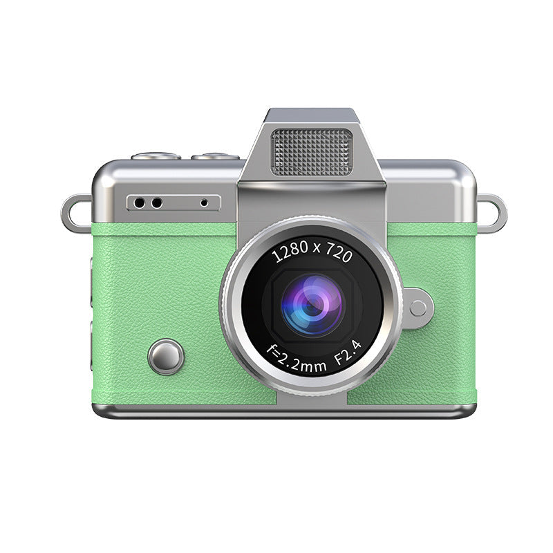 Miniature Digital Camera in mint green textured plastic with silver trim, a prominent circular lens and retro design