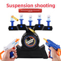 Moving Target Tabletop Game with a black plastic base, blue floating targets and colorful toy blasters for suspension shooting.
