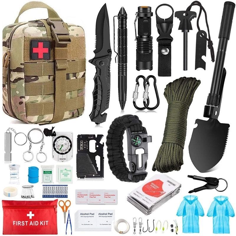 Outdoor Survival Tactical Bag in tan camouflage fabric with a red cross patch, shown with black survival tools, cord and first aid supplies