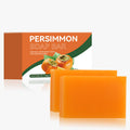 Persimmon Scent Handmade Soap in vivid orange rectangular bars, with orange and green persimmon-themed packaging.