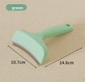 Pet Hair Removal Brush in mint green plastic with a curved head, fine metal teeth, and an ergonomic handle
