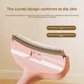 Pet Hair Removal Brush in pink plastic with a curved head and closely spaced V-shaped metal comb teeth