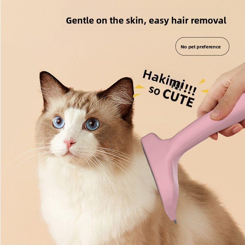 Pet Hair Removal Brush with a smooth pink plastic handle and flat angled grooming head, gently used to brush a fluffy cat