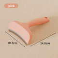 Pet Hair Removal Brush in peach pink plastic with a curved head, fine metal teeth and ergonomic handle
