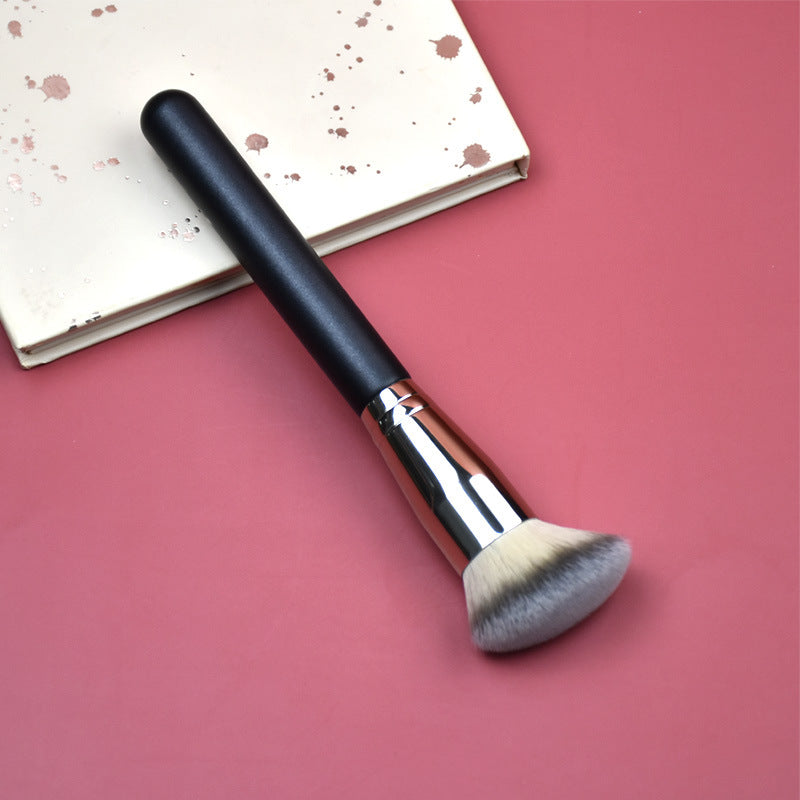 Professional Makeup Brush Set featuring a single dense angled brush with a black handle, silver ferrule, and white-to-gray bristles