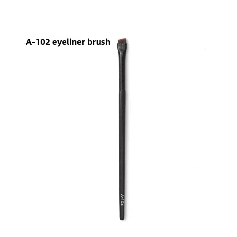 Professional Makeup Brush Set featuring a single black eyeliner brush with a slim handle and compact angled brown bristles