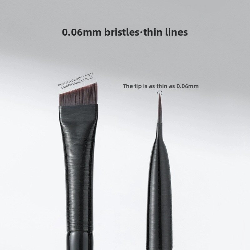 Professional Makeup Brush Set featuring two black brushes with fine synthetic bristles, including an angled head and 0.06 mm tip
