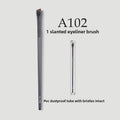 Professional Makeup Brush Set with a slim black slanted eyeliner brush and a clear protective tube for bristles