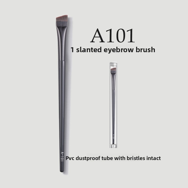 Professional Makeup Brush Set slanted eyebrow brush with slim dark handle, angled bristles, and clear protective tube