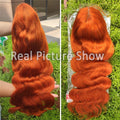 Real Human Hair Wigs in vibrant copper ginger with long, glossy body waves and a center part