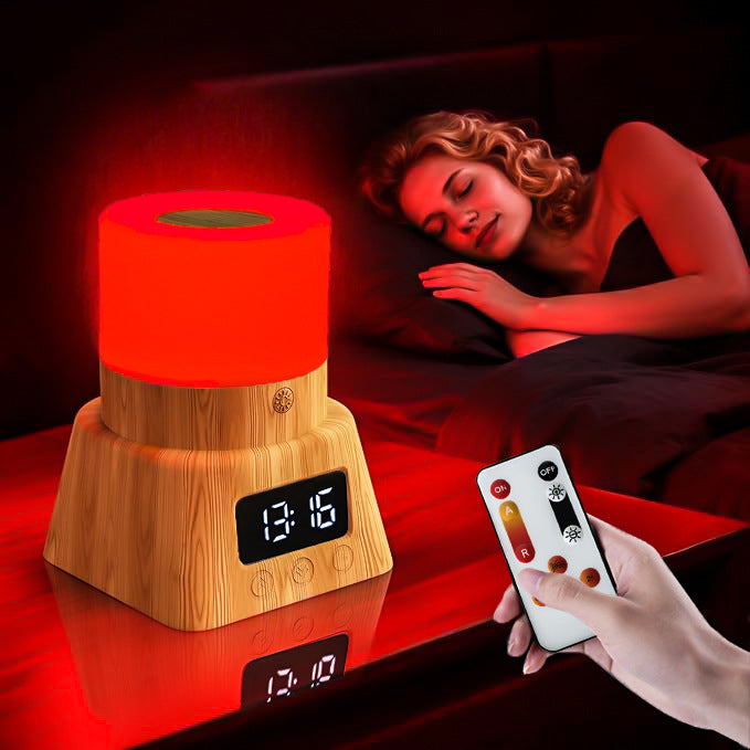Red Light Therapy Lamp with red glowing cylindrical shade, wood-grain base, digital clock display and remote control