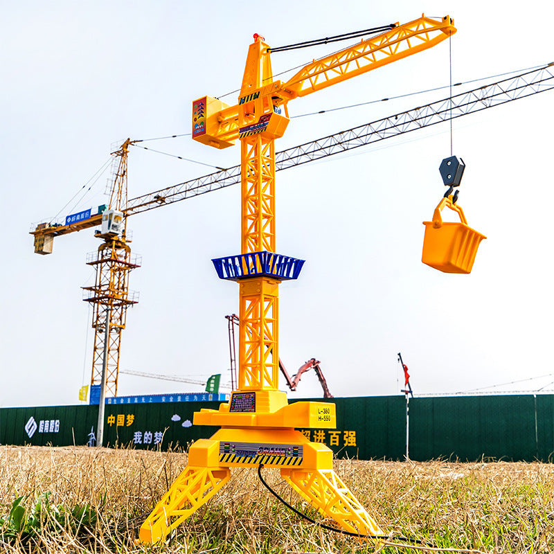 Remote Control Tower Crane Toy in bright orange plastic with a lattice boom, blue details and a suspended bucket.
