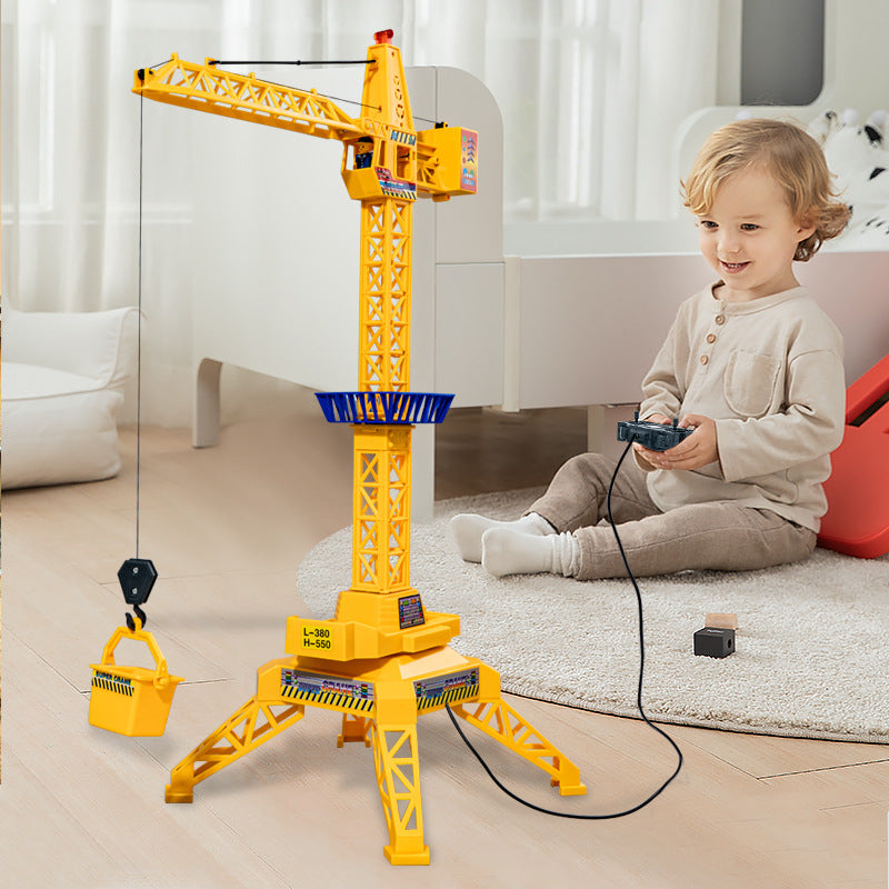 Remote Control Tower Crane Toy in bright orange plastic with a lattice boom, blue details and a suspended bucket.
