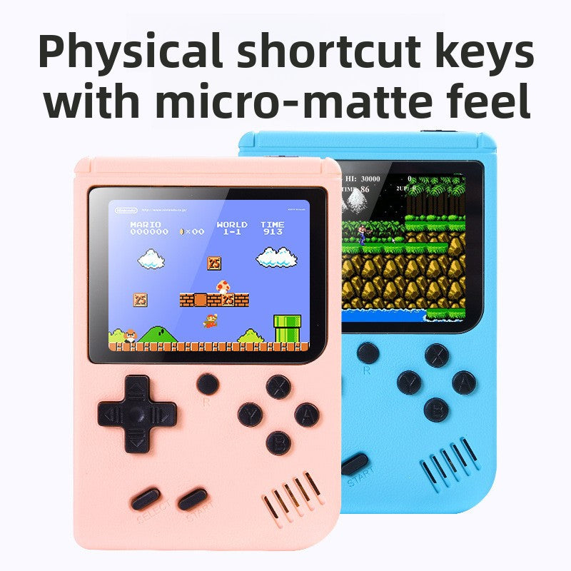 Retro Handheld Game Console in pastel pink plastic with black buttons, textured shell, and colorful game screen.