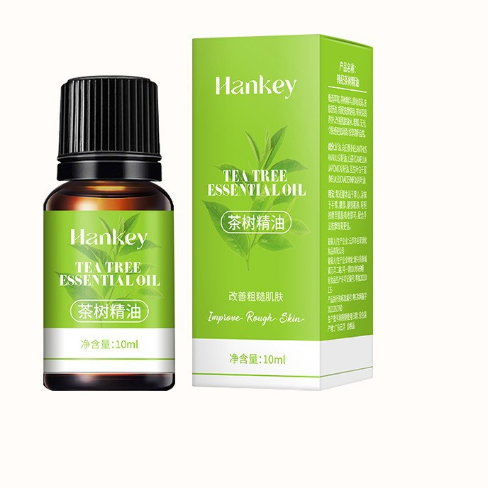 Rose Ginger Mugwort Massage Essential Oil shown as a 10 ml amber bottle with a black ribbed cap and green tea tree label